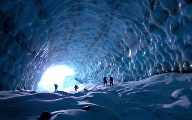 hikers in ice cave