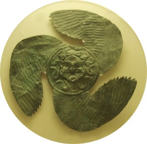 Winged Gorgoneion from Olympia, originally an apotropaic shield decoration, early sixth century BC (Wikimedia)